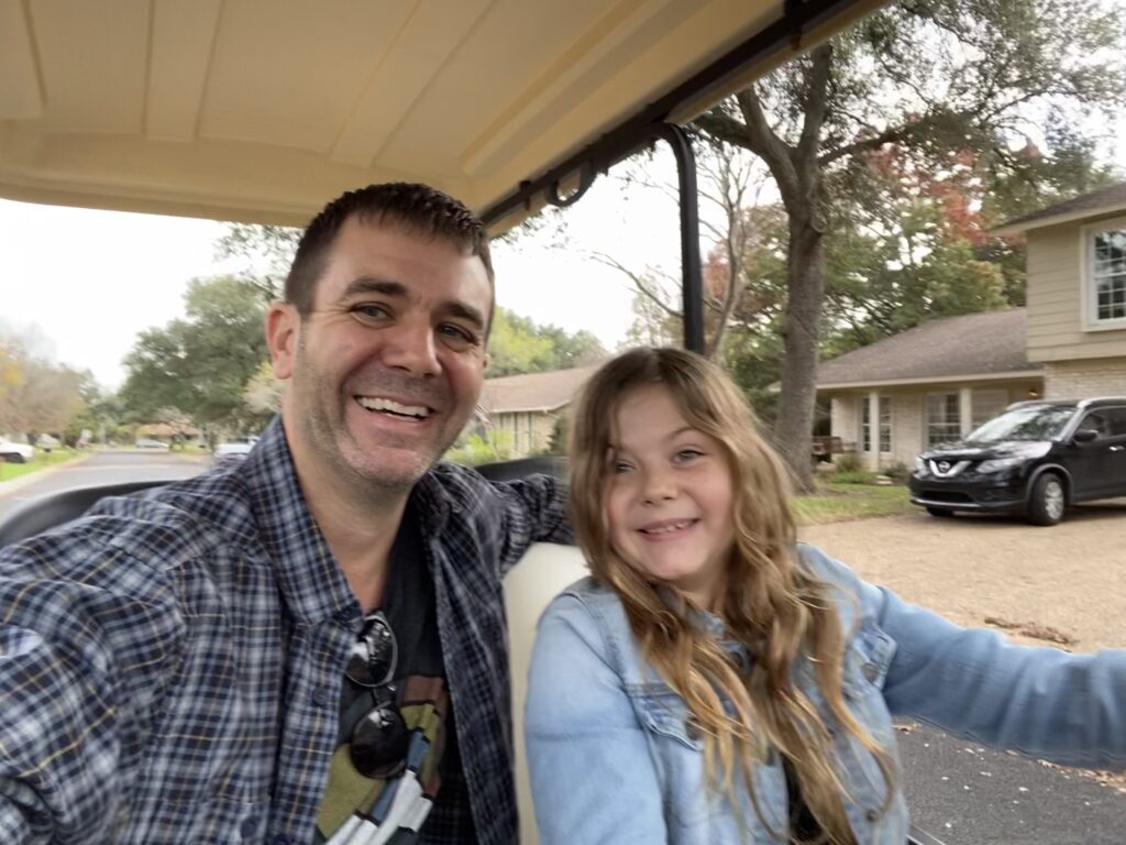 Matt & Ava out on our first golf cart ride.